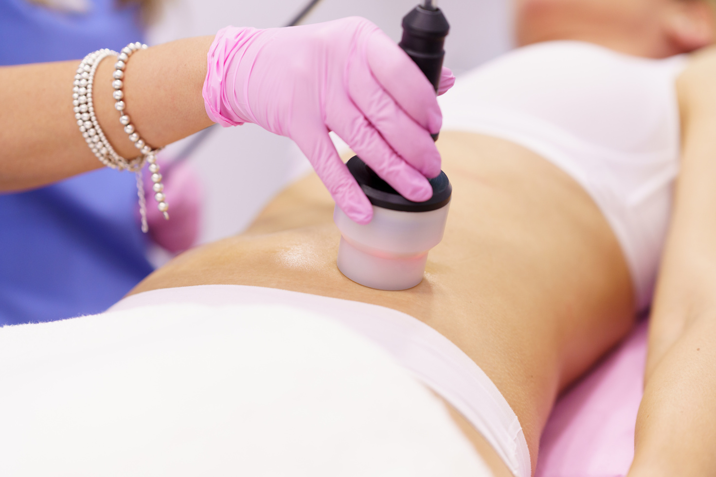 Woman Getting Body Contouring Treatment